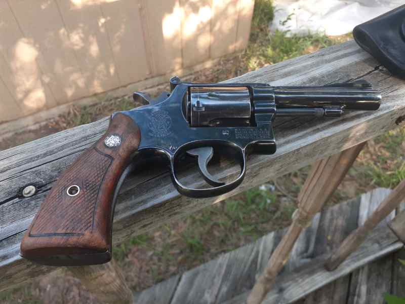 High bid for flood help Smith Wesson mod 15 1959