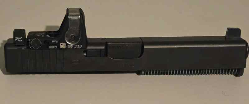 OEM Glock 17.3 with Trijicon night sights and RMR