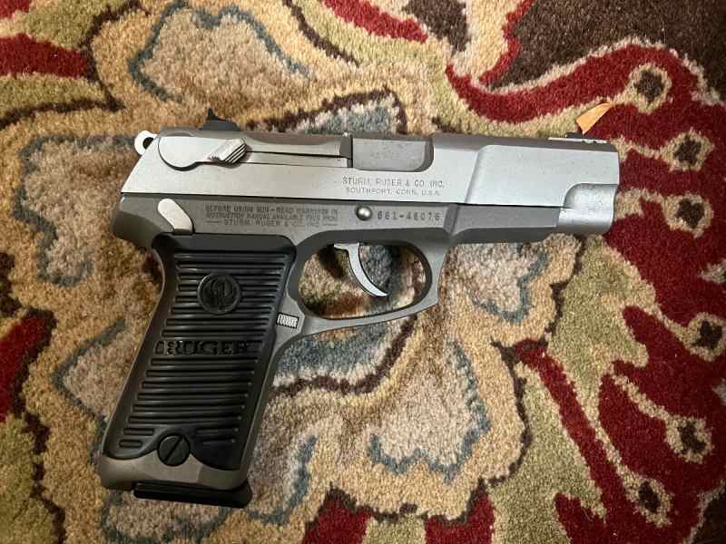 Ruger P90 .45 in good condition 2 magazines w ammo
