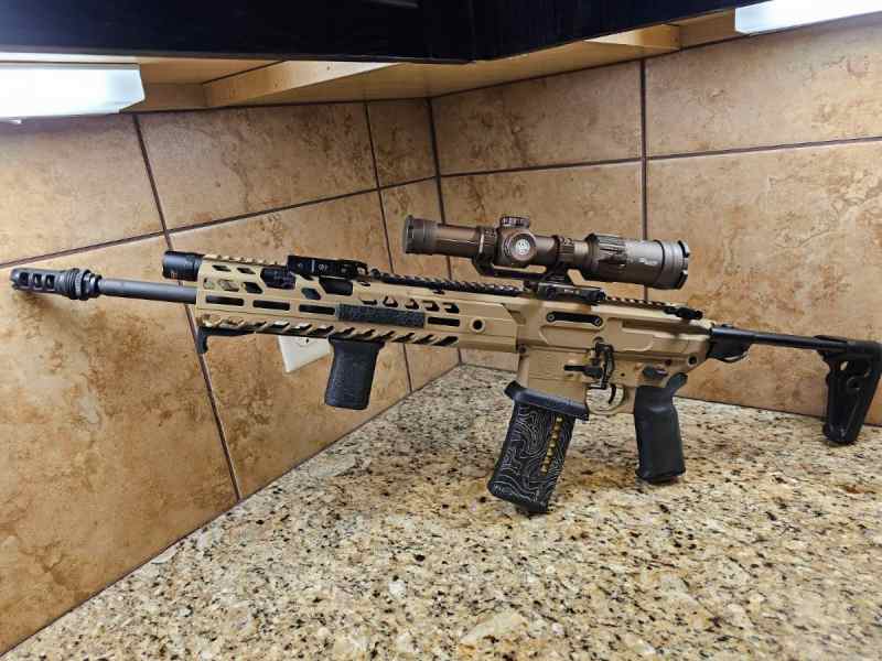 Sig Sauer MCX Virtus rifle with telescopic stock 