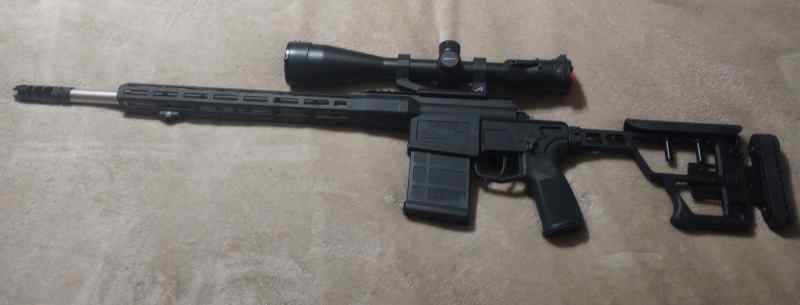 Trade Sig Cross 6.5CM For A RPR In 308