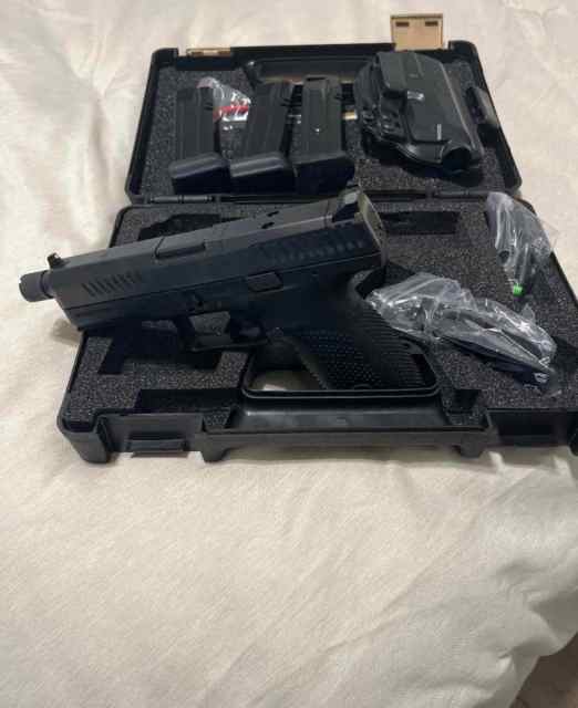 Optics ready CZ P10C with threaded barrel. 